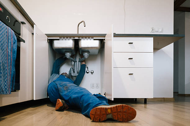Professional Drain Cleaning technician working in Quinton, VA